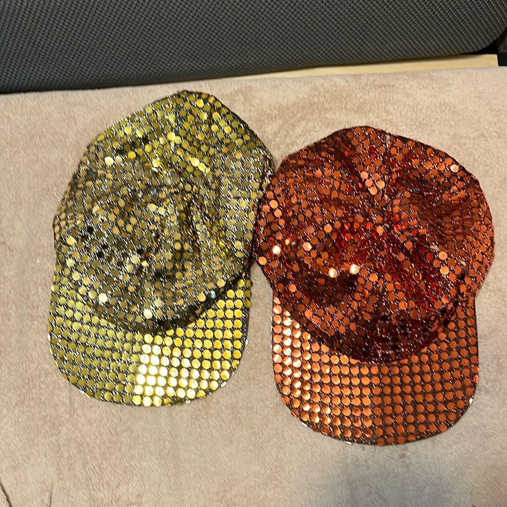 2 women’s caps with sparkles